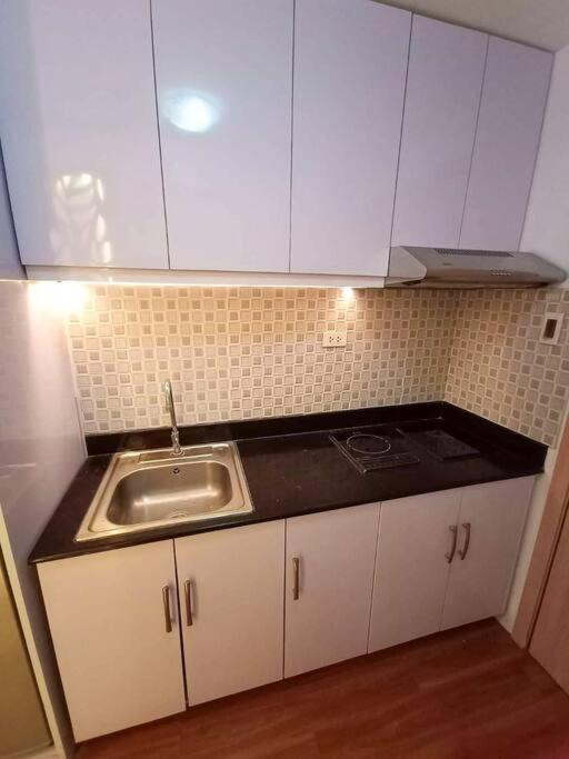 Cozy Studio Unit At Sun Residences Quezon City Kültér fotó