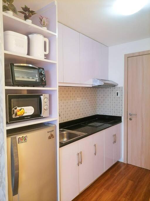Cozy Studio Unit At Sun Residences Quezon City Kültér fotó
